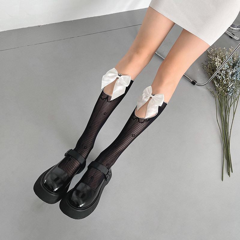 Hollow out bowknot knee high socks