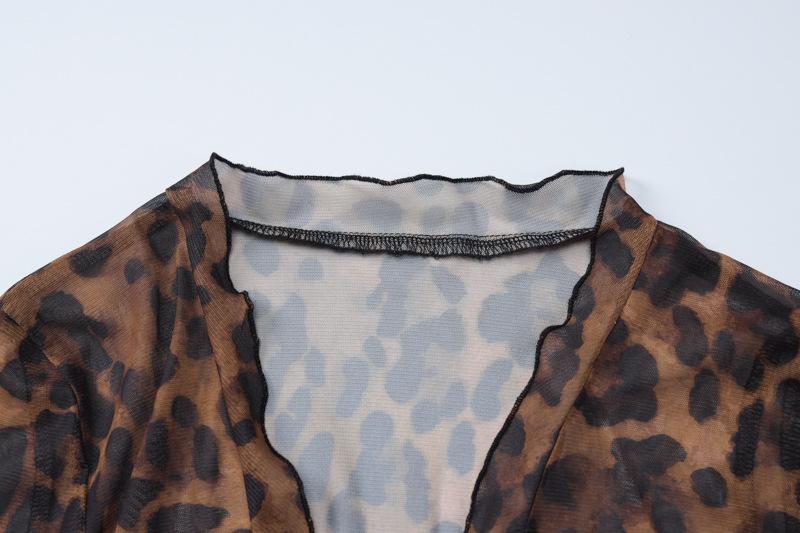 Long flared sleeve leopard print ruffle knotted sheer mesh top